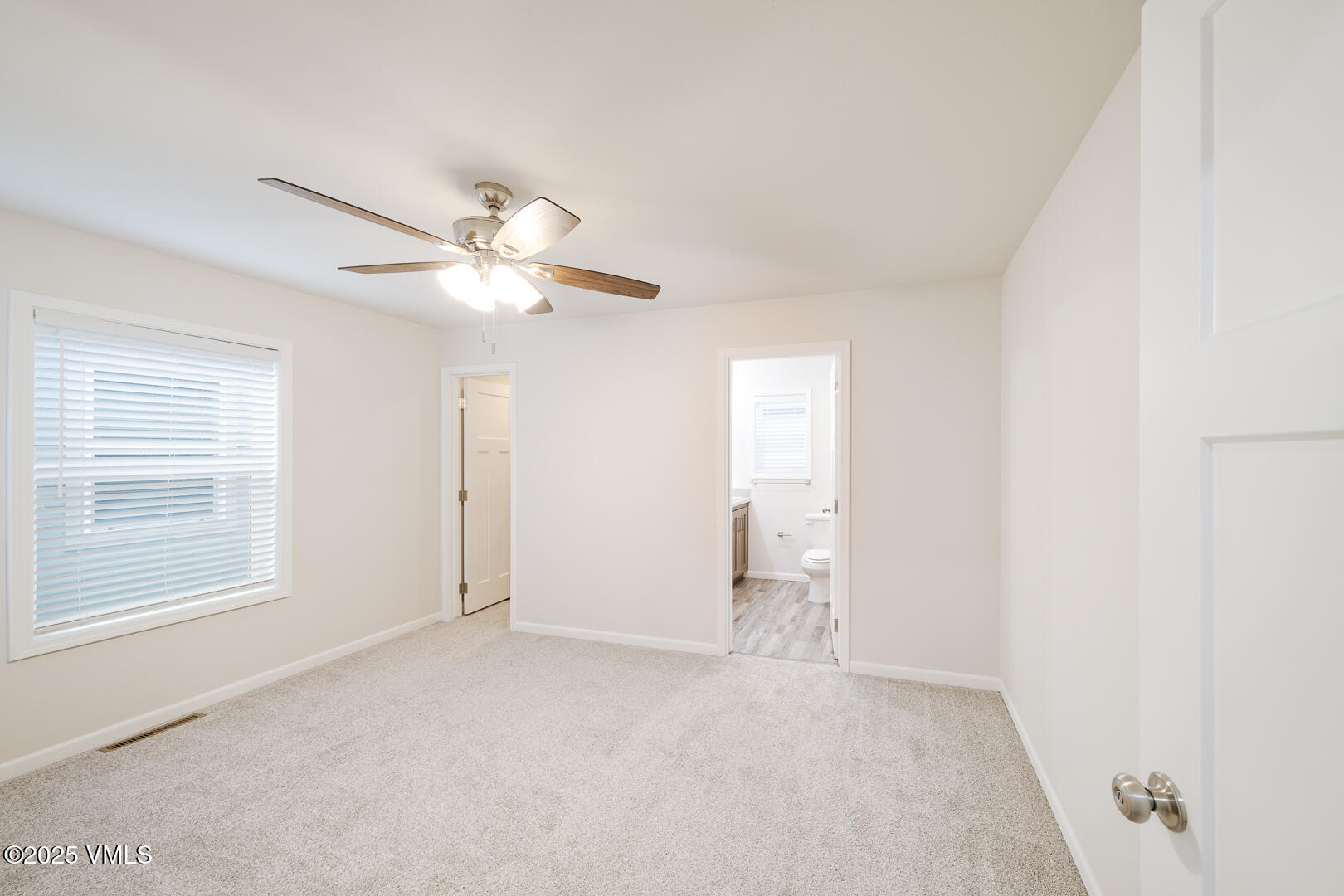 30 Buffalo Circle, Unit 21 Gypsum, CO 81637 - Photo 5 of 16 a view of an empty room with a window