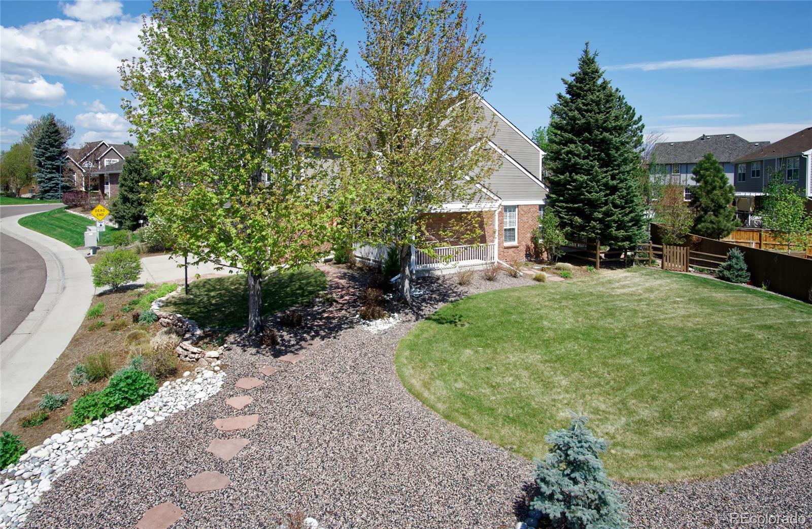 8592 Forrest Street Highlands Ranch, CO 80126 - Photo 2 of 40 a view of a backyard with sitting area