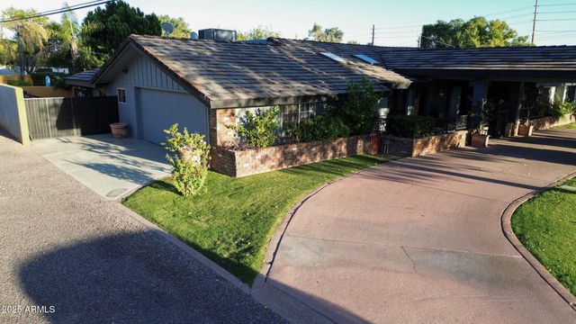 a view of a swimming pool with lounge chair