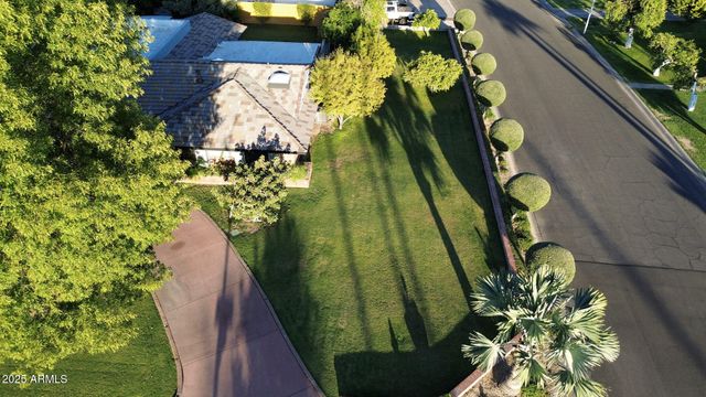 a view of swimming pool from a balcony