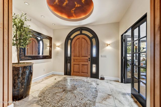 an aerial view of a house with a garden