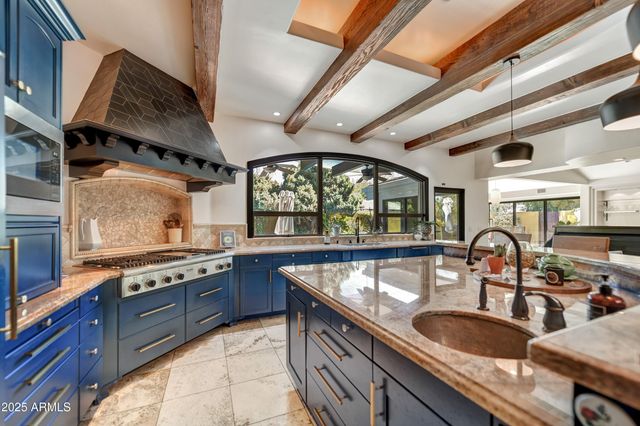 a view of a livingroom with furniture and entryway
