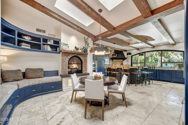 a kitchen with stainless steel appliances granite countertop a sink and a counter space