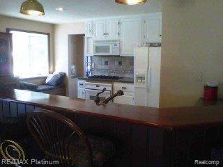6136 Brophy Road Howell, MI 48855 - Photo 3 of 25 kitchen from great room