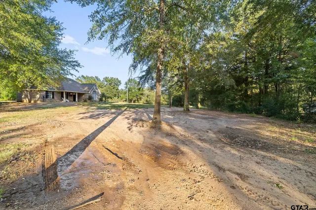 a view of a swimming pool with an outdoor space