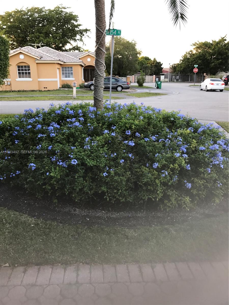 15448 Southwest 92nd Street Miami, FL 33196 - Photo 13 of 36 a view of outdoor space with garden