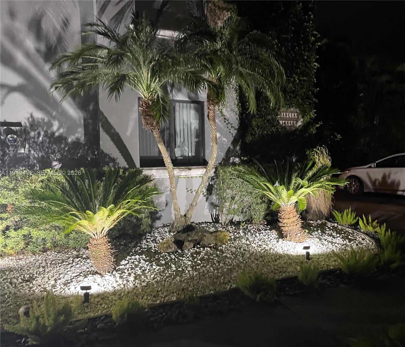 15448 Southwest 92nd Street Miami, FL 33196 - Photo 29 of 36 a view of a house with a yard