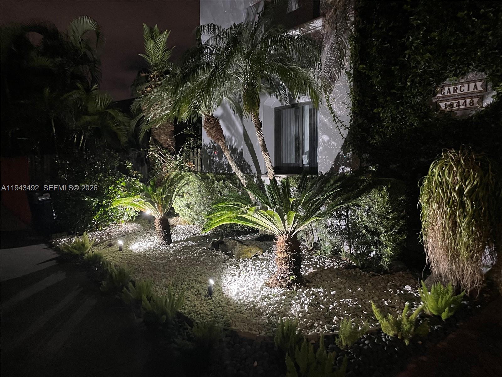 15448 Southwest 92nd Street Miami, FL 33196 - Photo 30 of 36 a view of a plant in a garden