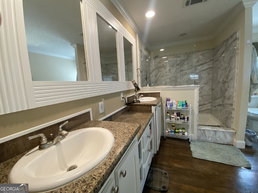 347 River Trail Martin, GA 30557 - Photo 14 of 29 a bathroom with a tub sink and mirror