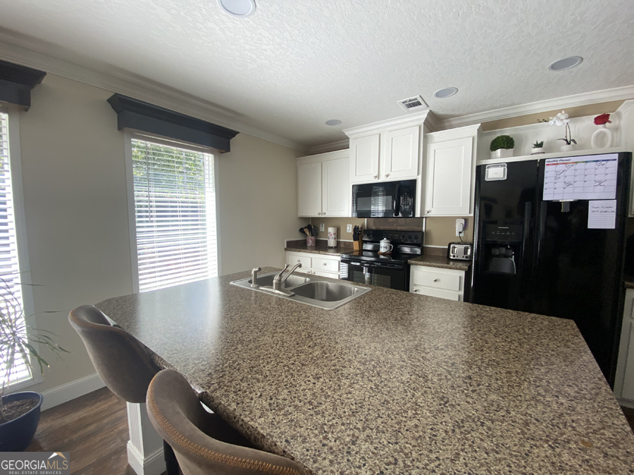 347 River Trail Martin, GA 30557 - Photo 3 of 29 a kitchen with granite countertop lots of counter top space and appliances