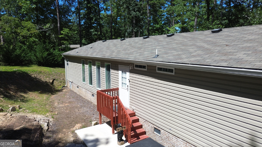 347 River Trail Martin, GA 30557 - Photo 7 of 29 a backyard of a house with wooden floor