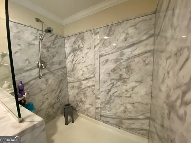 a bathroom with a shower curtain