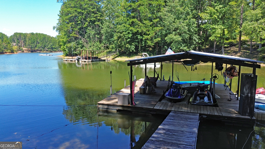 347 River Trail Martin, GA 30557 - Photo 9 of 29 a view of a lake with a deck