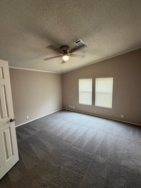 2321 Ridgeview Street Fort Worth, TX 76119 - Photo 7 of 10 Spacious room featuring vaulted ceilings, a ceiling fan with integrated lighting, new neutral tone carpeting, and two windows with blinds