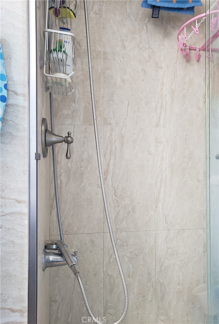 3929 West 5th Street, Unit 16 Santa Ana, CA 92703 - Photo 17 of 21 a bathroom with a shower