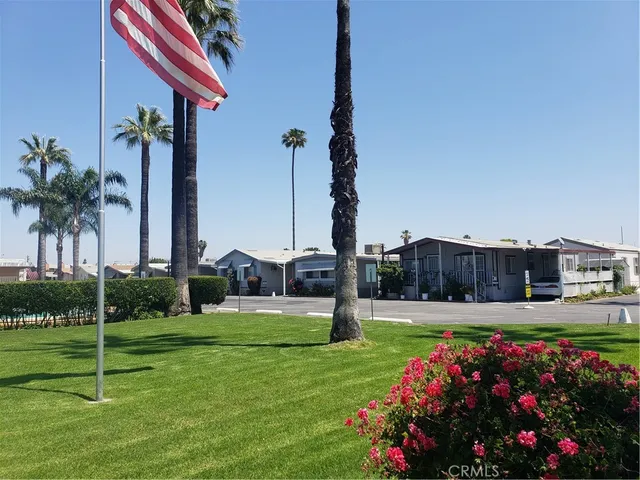 a view of a chair and tables in the patio
