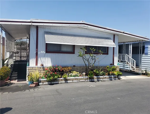 front view of house with outdoor seating