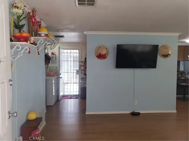 a bedroom with furniture and window