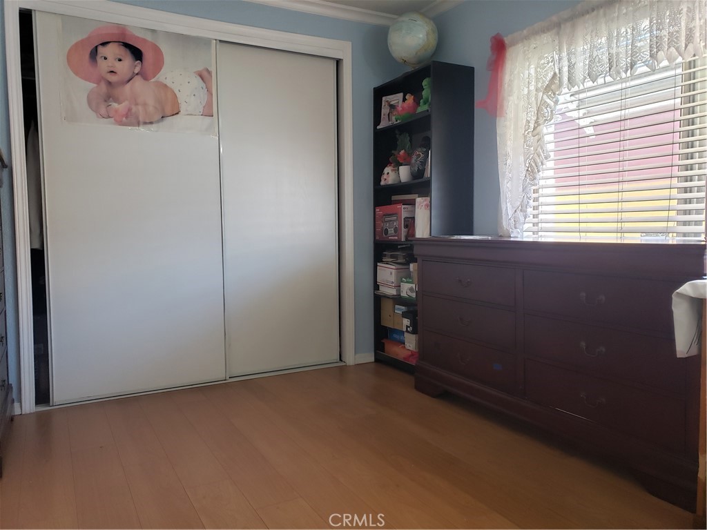3929 West 5th Street, Unit 16 Santa Ana, CA 92703 - Photo 10 of 21 a view of an empty room with a window