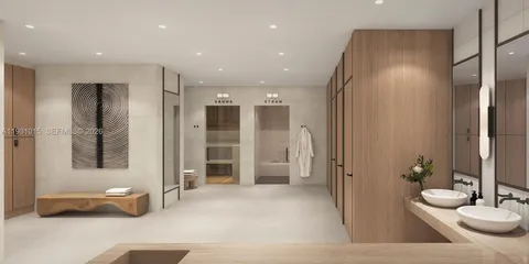 a bathroom with a tub and shower