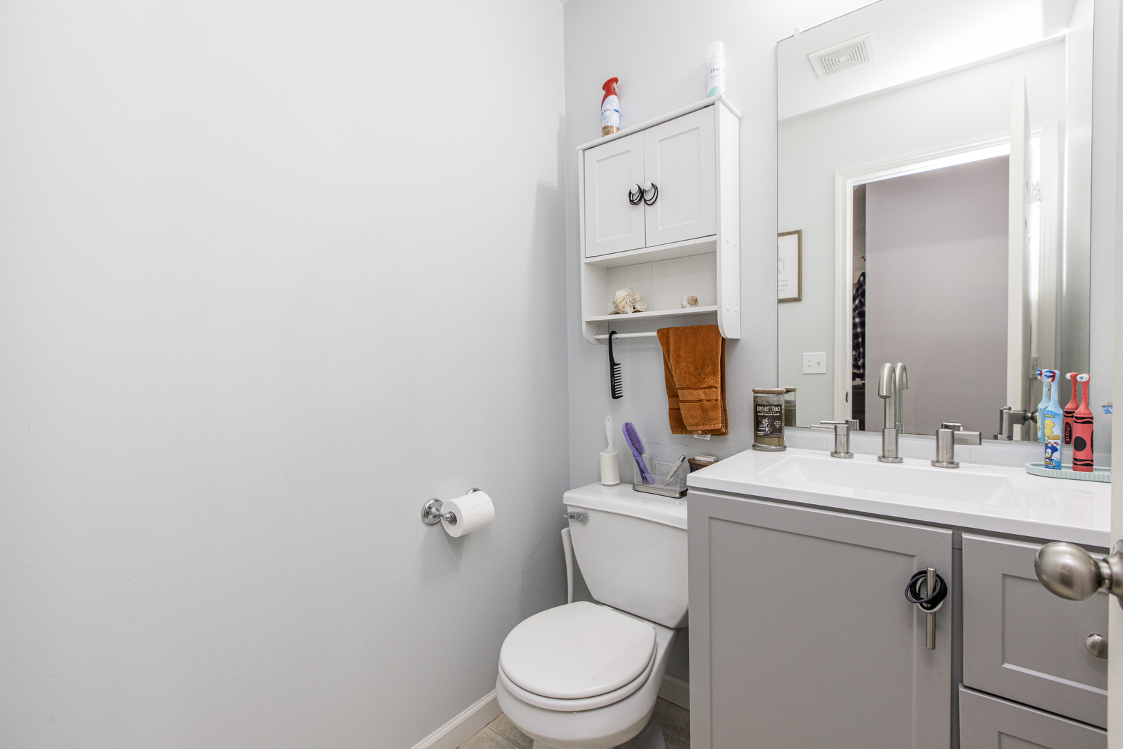 1111 Chippewa Street Normal, IL 61761 - Photo 14 of 35 a bathroom with a sink a toilet and mirror