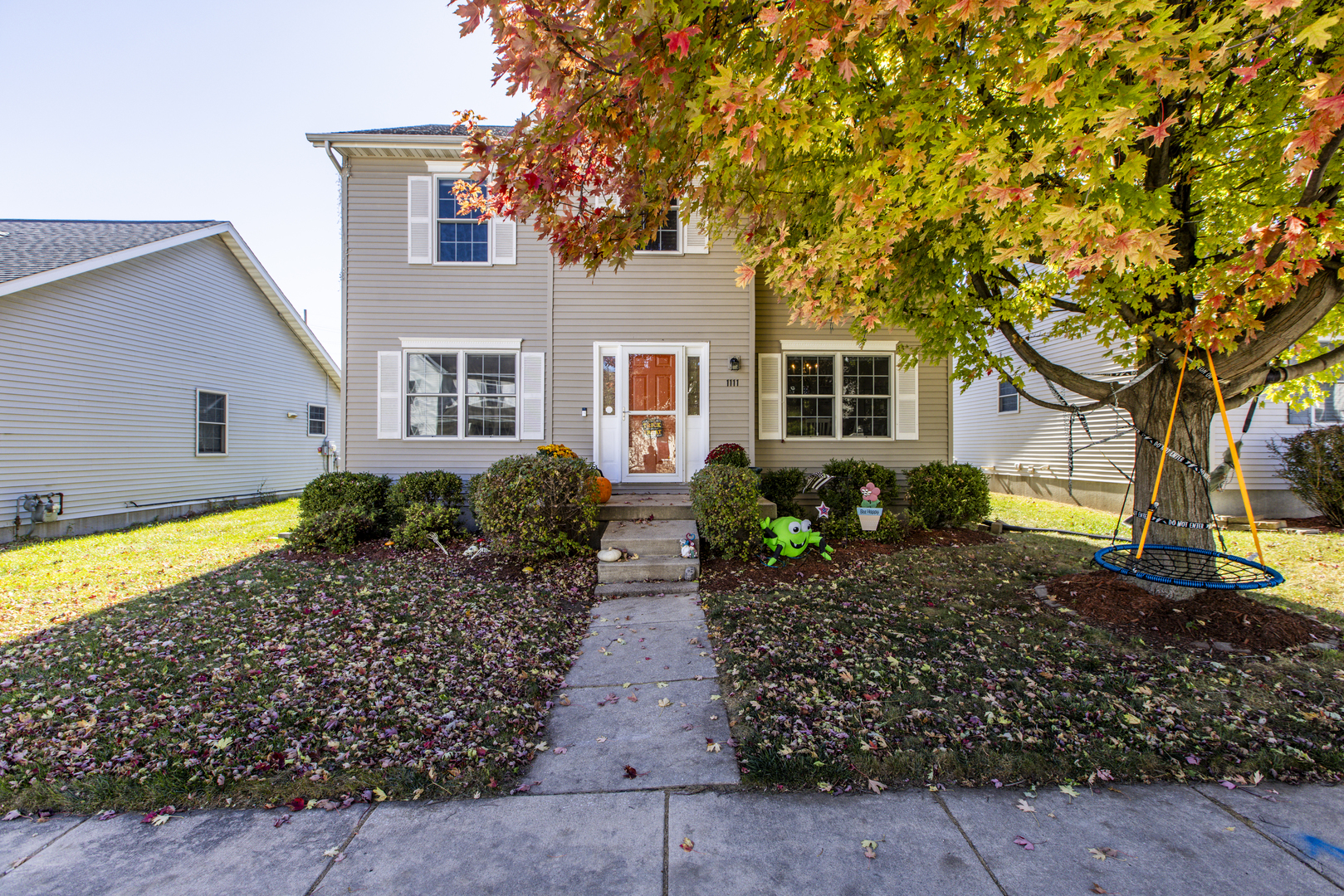 1111 Chippewa Street Normal, IL 61761 - Photo 2 of 35 a front view of a house with garden