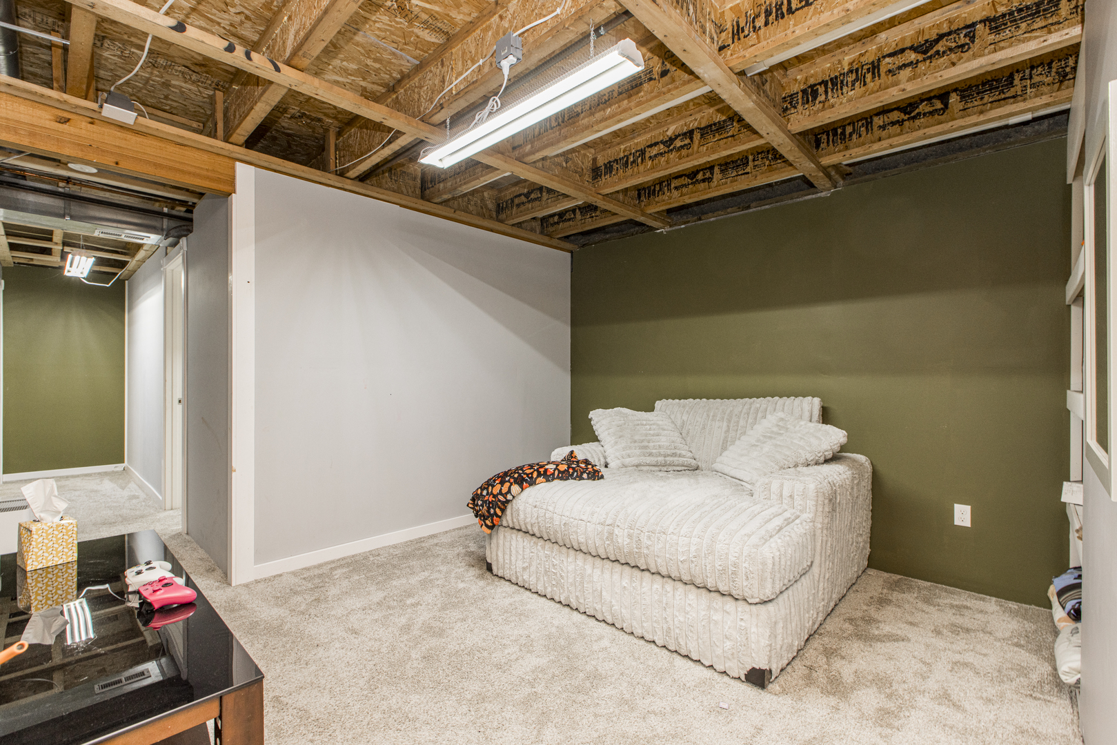 1111 Chippewa Street Normal, IL 61761 - Photo 26 of 35 a living room with a couch and a stove next to a window