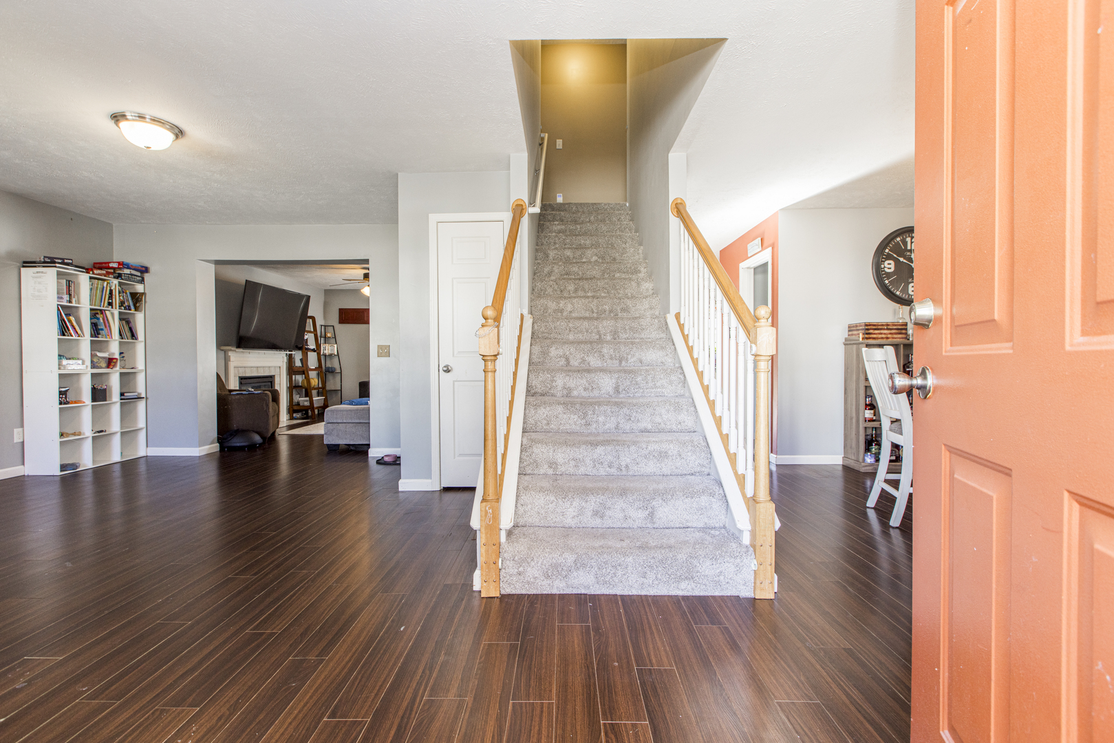 1111 Chippewa Street Normal, IL 61761 - Photo 3 of 35 a view of a livingroom with wooden floor and stairs