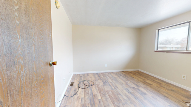 1348 Sagewood Road Price, UT 84501 - Photo 16 of 34 Spare room featuring wood finished floors and baseboards