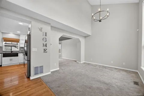 a view of a livingroom with wooden floor