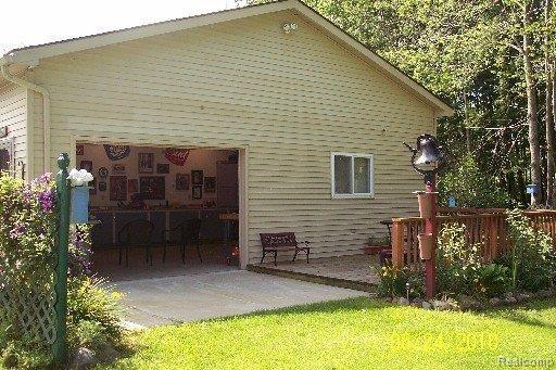 5015 North Burkhart Road Howell, MI 48855 - Photo 6 of 18 5015 GARAGE REAR