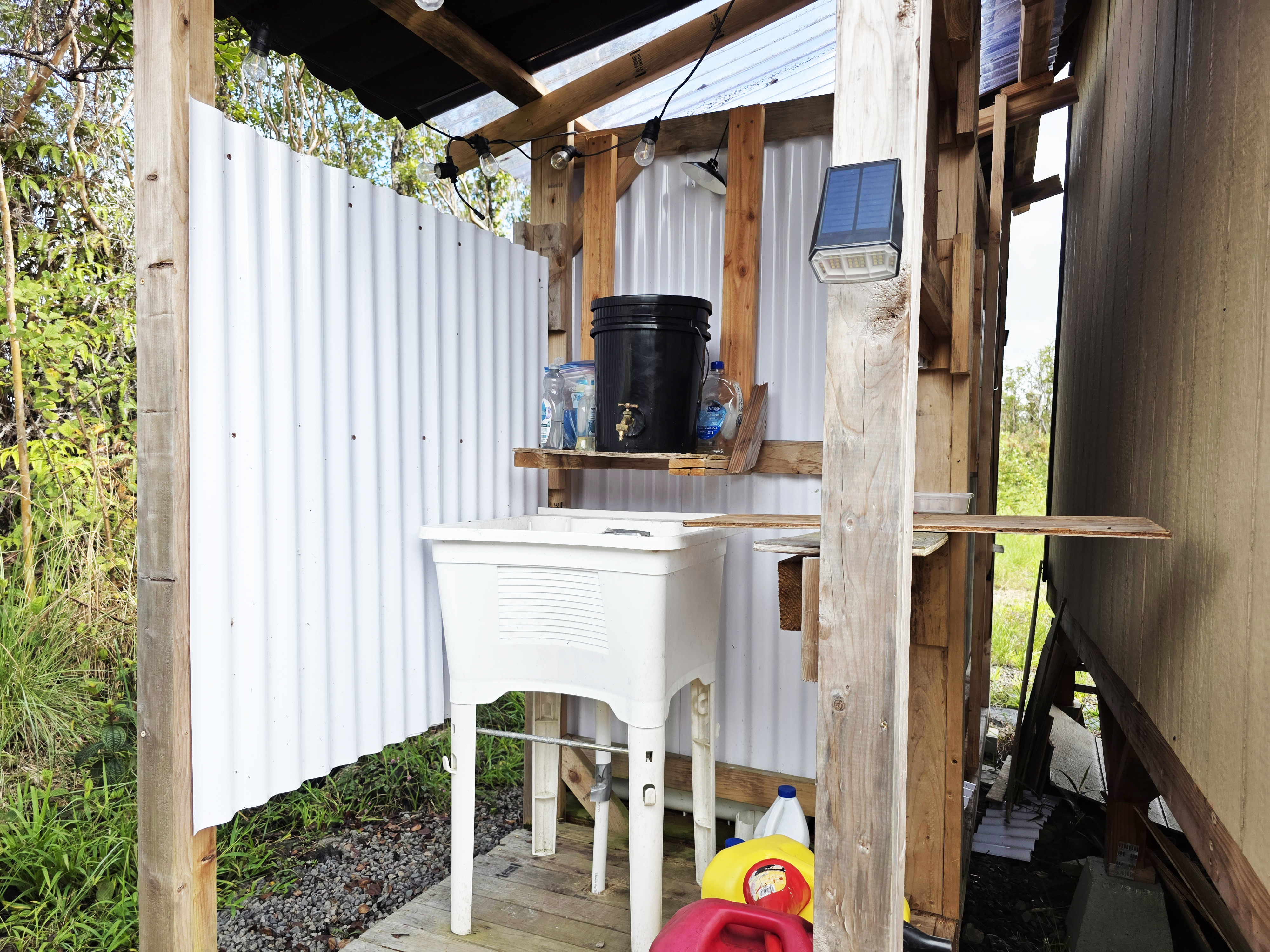 11-2550 Lot 76 Ohialani Road Mountain View, HI 96771 - Photo 20 of 22 a view of entryway with wooden walls