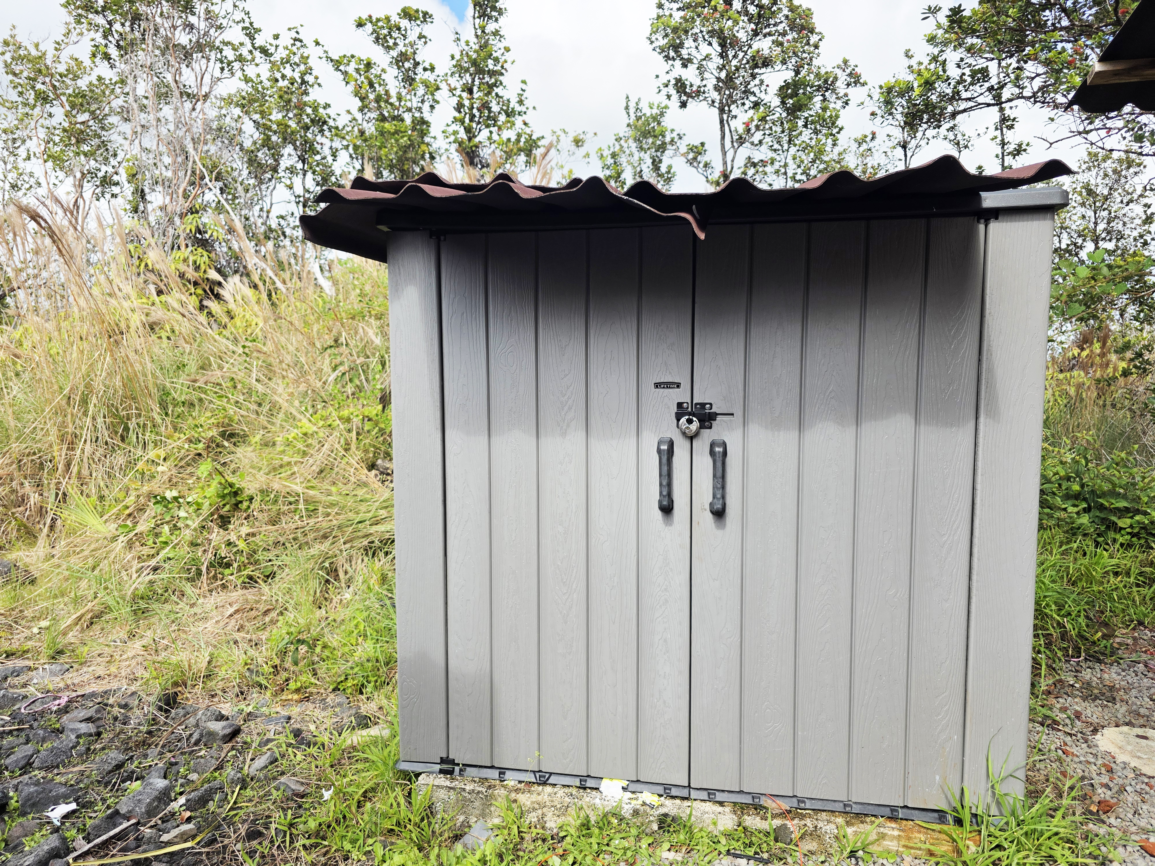 11-2550 Lot 76 Ohialani Road Mountain View, HI 96771 - Photo 21 of 22 a close view of door with backyard of a house