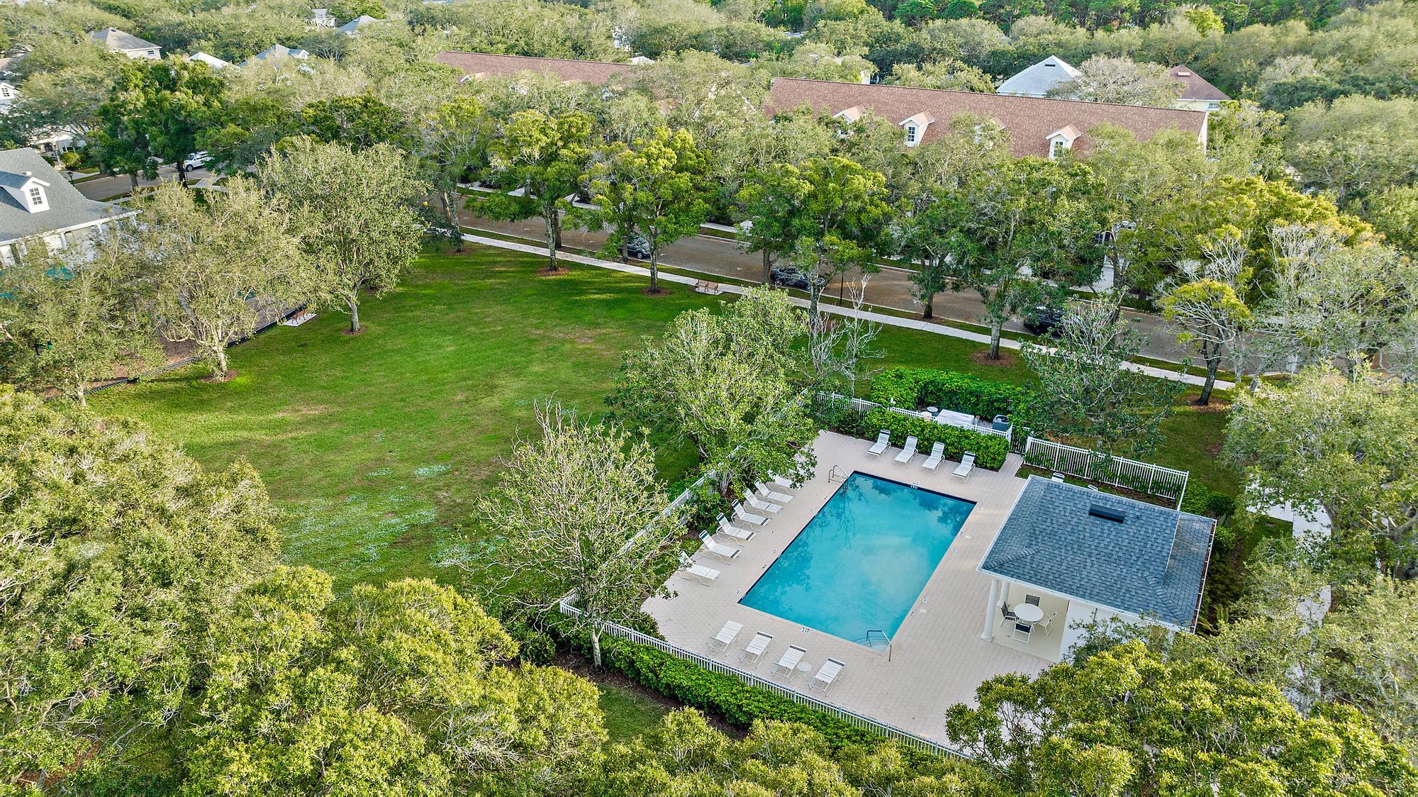 122 Date Palm Drive Jupiter, FL 33458 - Photo 27 of 37 Aerial View of Noth Pool/Greenspace