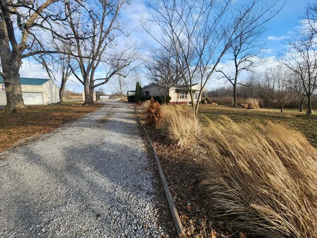 a view of road with trees