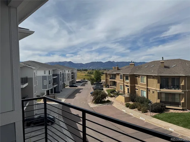a view of a terrace with sitting area