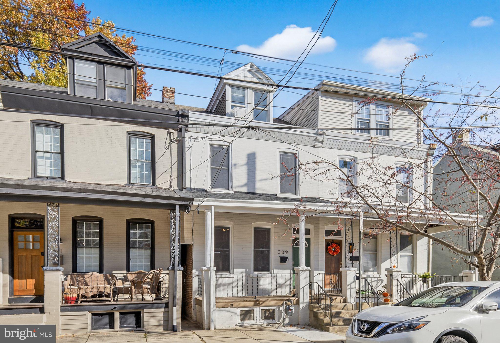a front view of a building with glass windows