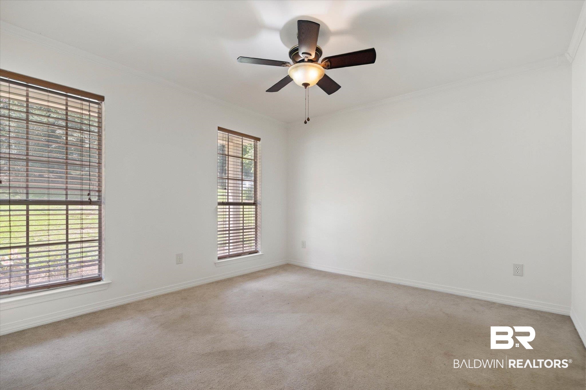 3032 Autumn Ridge Drive West Mobile, AL 36695 - Photo 13 of 20 Spare room with ornamental molding, light carpet, and a ceiling fan