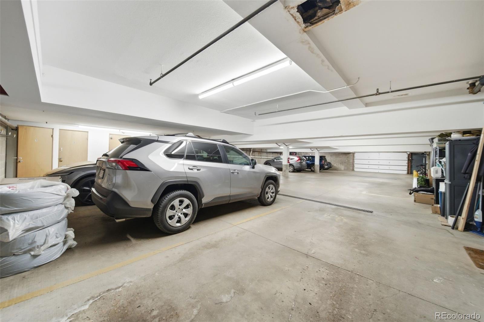 3045 Umatilla Street Denver, CO 80211 - Photo 30 of 48 a view of car parking
