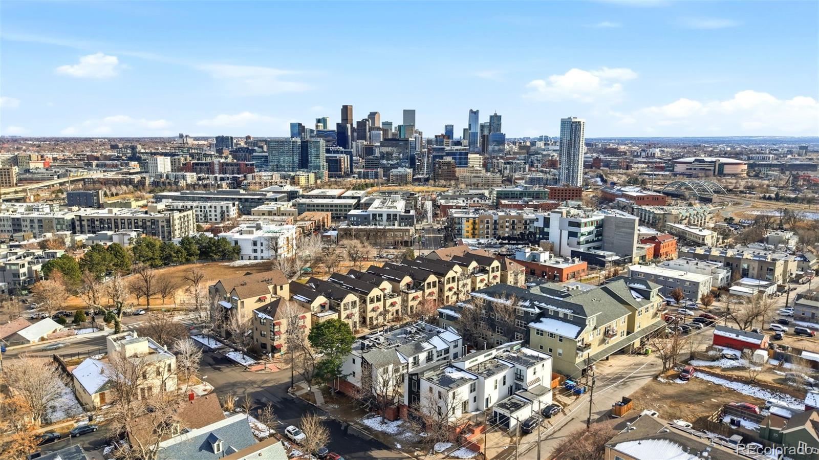 3045 Umatilla Street Denver, CO 80211 - Photo 37 of 48 an aerial view of a city with lots of residential buildings