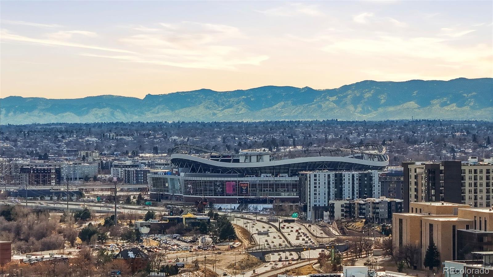 3045 Umatilla Street Denver, CO 80211 - Photo 39 of 48 a view of city with tall buildings