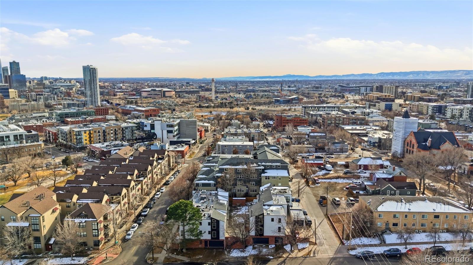 3045 Umatilla Street Denver, CO 80211 - Photo 40 of 48 an aerial view of a city with lots of residential buildings