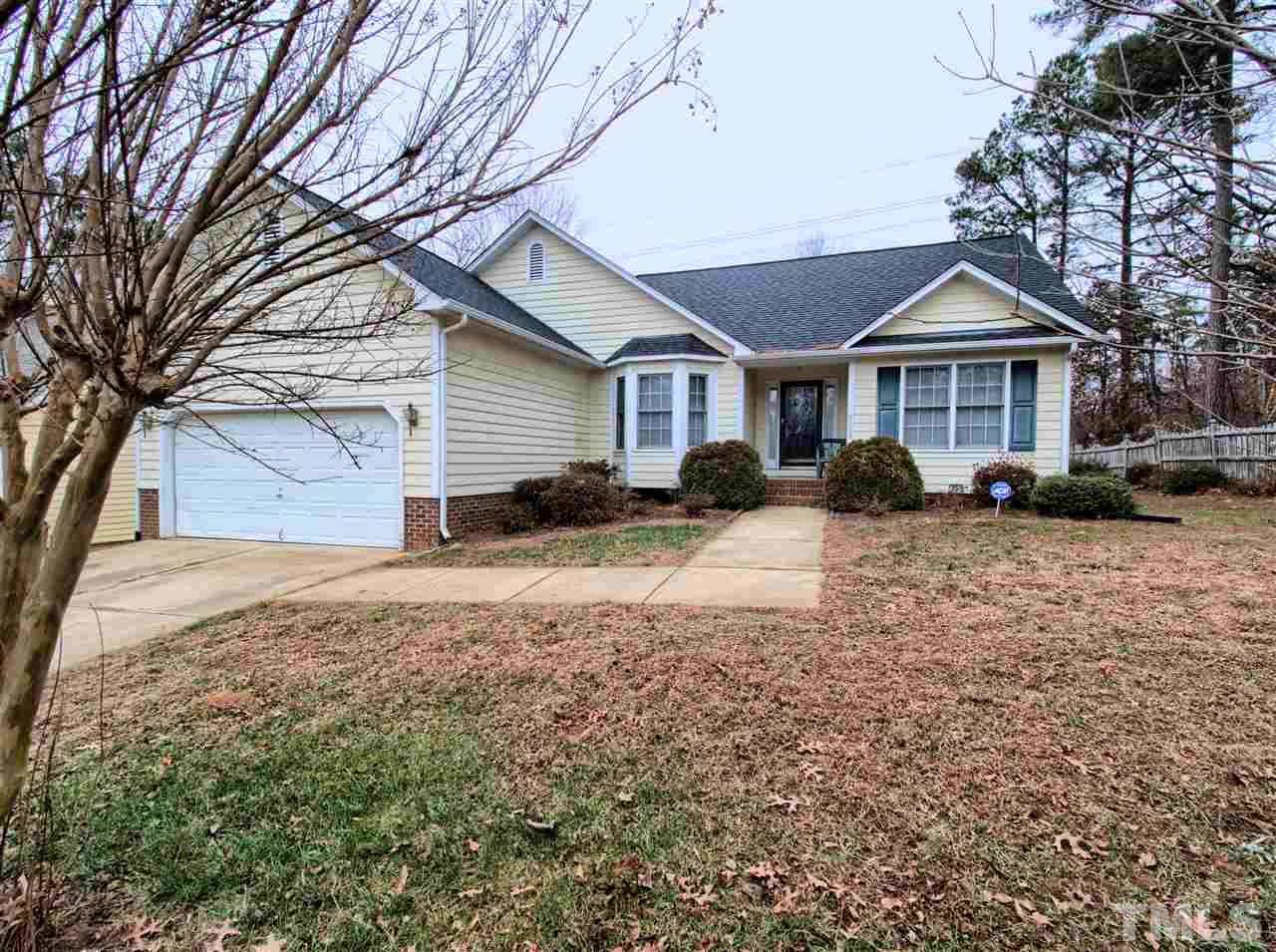 9513 Cub Trail Raleigh, NC 27615 - Photo 1 of 8 a view of a yard in front of house