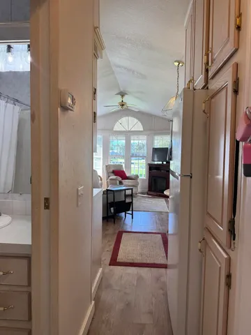 a bathroom with a shower and a mirror