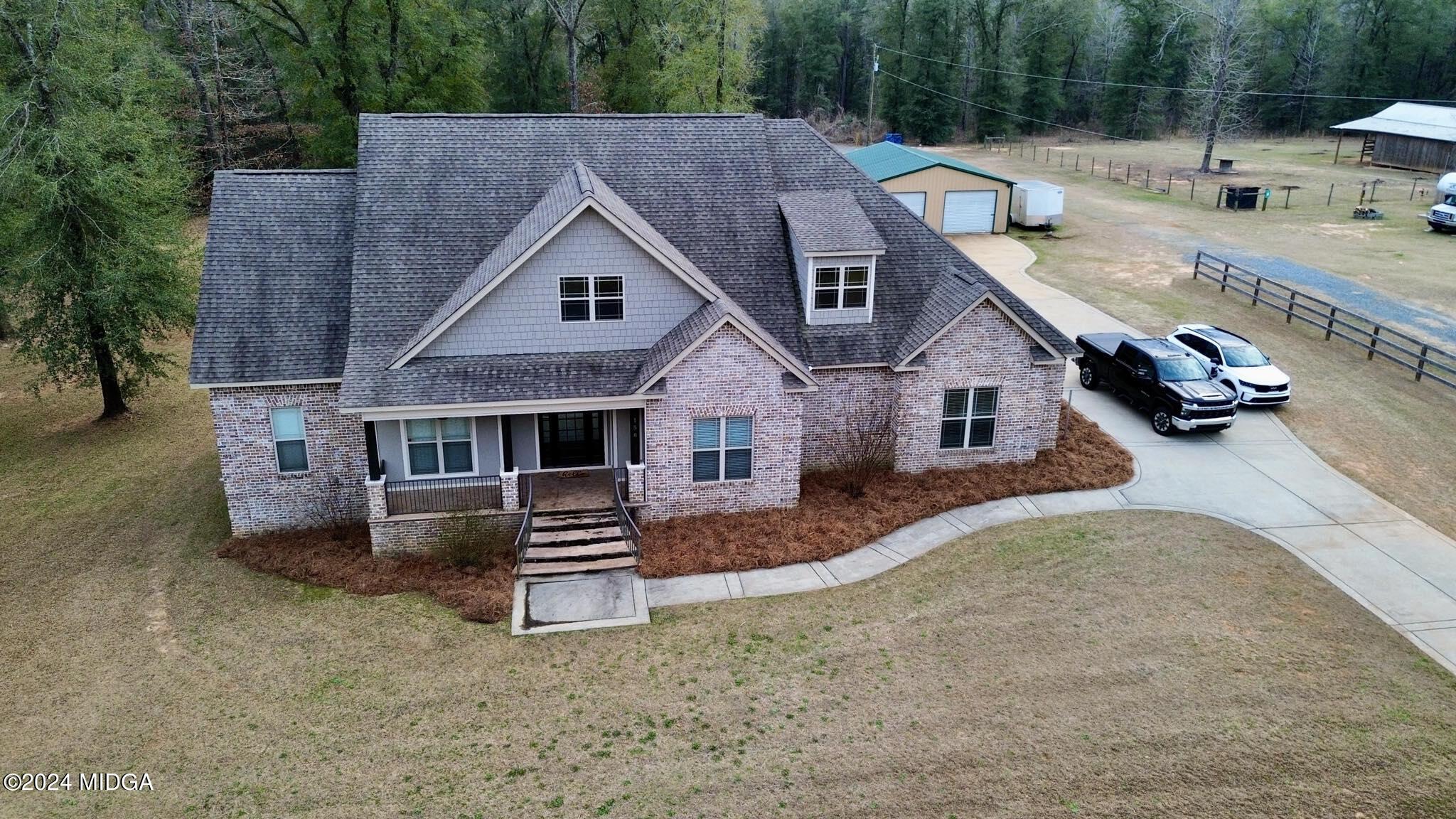158 Harper Road Perry, GA 31069 - Photo 1 of 46 front view of a house with a patio