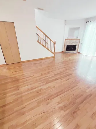 a view of a livingroom with wooden floor