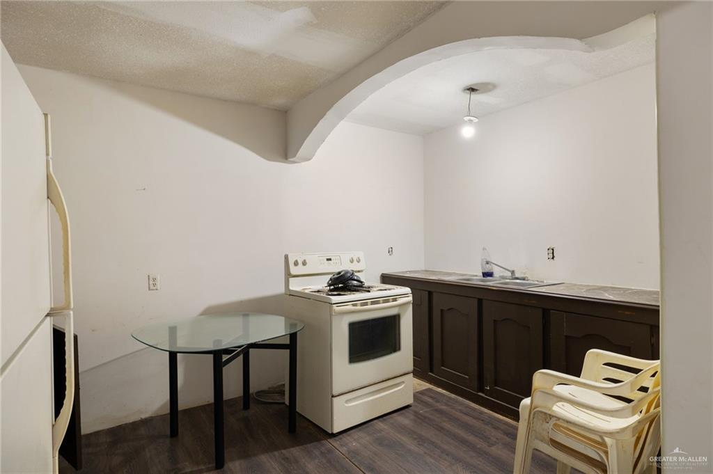 13615 Miraflores Street Edcouch, TX 78538 - Photo 4 of 13 Living room featuring wood finished floors