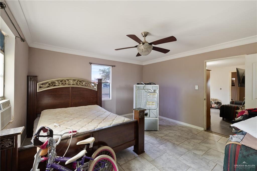 13615 Miraflores Street Edcouch, TX 78538 - Photo 5 of 13 Living room with wood finished floors