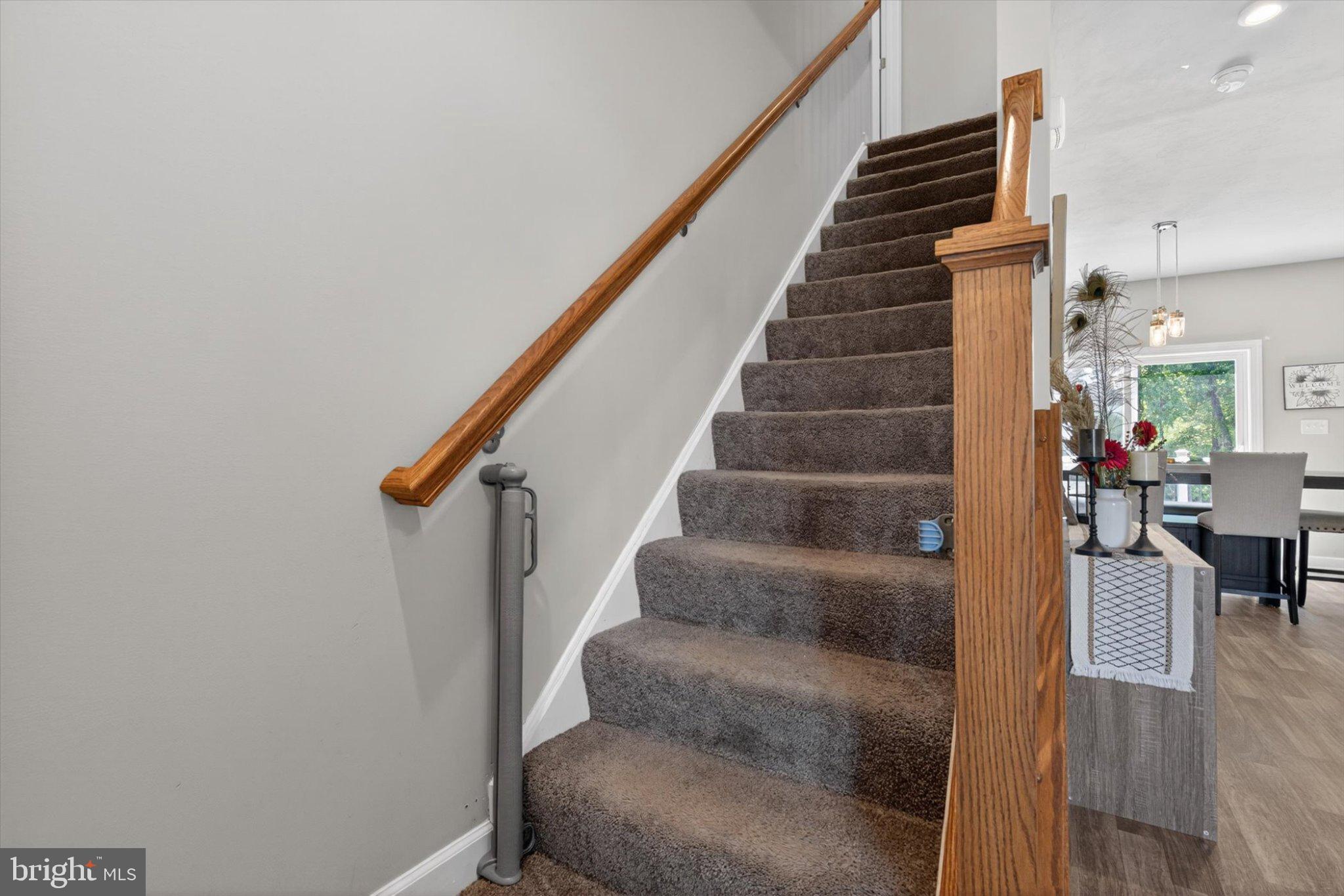 255 Kinneman Road Abbottstown, PA 17301 - Photo 19 of 39 Inviting staircase to cozy living space.