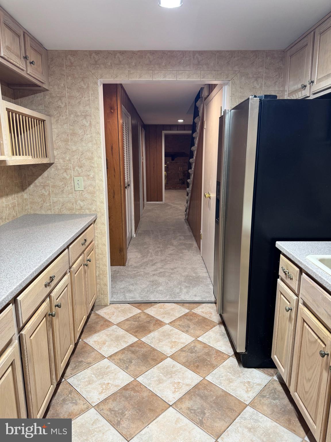 6703 Greenview Lane Springfield, VA 22152 - Photo 40 of 41 a bathroom with a sink and a mirror